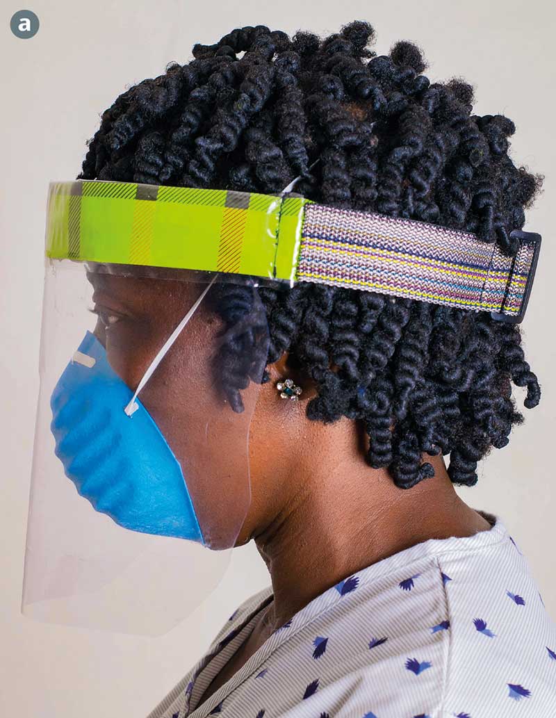 Female health worker wearing a homemade face shield and a blue face mask