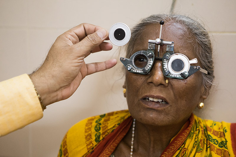 Elderly lady wearing refracting spectacles