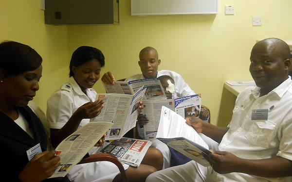 Staff reading the Community Eye Health Journal. BOTSWANA. © Tatowela Mmoloki. 2nd place in the 2011 Community Eye Health Journal Photograph Competition